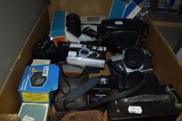 A selection of cameras and accessories including Fujica st701, Nikon and Olympus