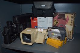 A selection of photographic equipment including Swift 10x50 binoculars and Canon DVD camcorder