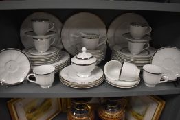 A part Andrea Fontebasso porcelain dinner service having silver gilt banding to edges and