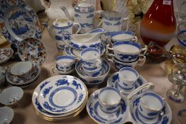 A selection of tea and coffee wares in a traditional Dragon design by Coalport