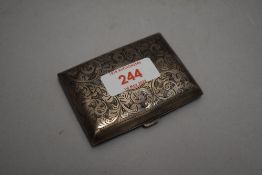 An HM silver cigarette case having engraved scroll decoration and monogrammed cartouche, approx 41g