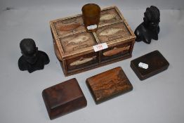 A selection of small trinket or jewellery cases and a pair of ebonised African heads