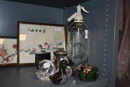 A selection of glass wares including Schweppes soda syphon and paper weight