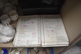 A metal fold out box containing a number of various maps and ordnance survey guides