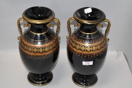 A pair of Jackfield stype vases, of baluster form with scrolled gilt embellished handles and bands
