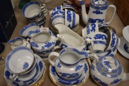 A selection of tea and coffee wares by Coalport in a traditional Dragon design