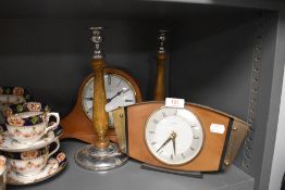 Two mantle clocks one by Metamec and another Napoleon design by Simpson and Fox also two candle