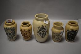 A group of four stoneware cream jars and Numol 'Body Builder' jar
