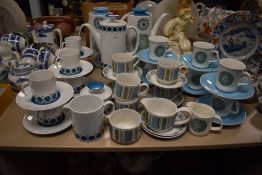 Three mid century transfer printed tea services including Meakin Aztec, Midwinter Broadway and