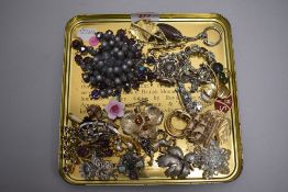 A selection of costume jewellery brooches including Silver scene, marcasite, bead etc