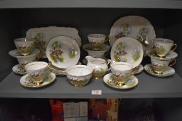 A mid century Royal Imperial part tea service decorated in a fox hunting design