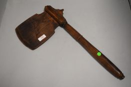 A 20th century hand made wooden replica battle axe