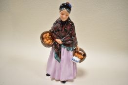 A Royal Doulton figure study the Orange Lady HN1759