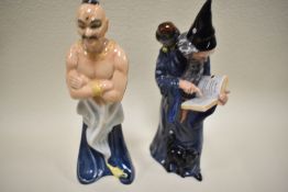 Two Royal Doulton Figures The Genie HN2989 and the Wizard HN2877.