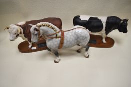Three matt glazed figures by Beswick including Fresian bull, Percheron Shire Horse and Hereford bull