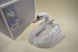 A Lladro swan with wings spread,with box.