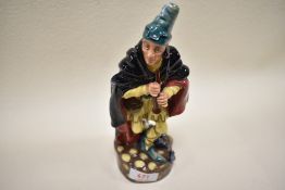A Royal Doulton figure study the Pied Piper HN2102