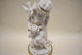 A porcelain figure base by Capodimonte of a maiden feeding birds signed G Pellati