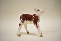 A Beswick study, Hereford calf 1406B, brown and white gloss.