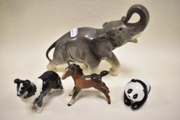 A Beswick foal or pony with a Beswick panda and similar sheep dog with a German made Elephant