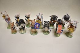 A complete set of Beswick pigs promenade figures including two limited edition figures produced