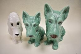 A trio of Sylvac dogs. terrier 1208,terrier 1207 and white gloss 'Sad Sam'.