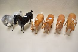 Four Beswick Palamino horses, Imperial 1557, Huntsmans horse 1484 x 2, Stocky jogging mare 855
