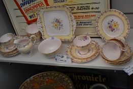 An art deco design part tea service by Tuscan china having floral and gilt pattern