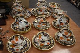 A selection of tea cup trios by Shelley late Foley in the Ashbourne pattern, Gainsborough design
