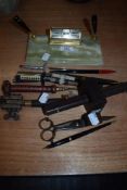 A selection of desk top letter openers with an art deco design perpetual calendar pen stand