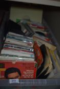 A large lucky dip box of 45's and albums - 1960's and more on offer here - viewing recommended - all