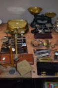 A large collection of various postal and domestic weighing scales