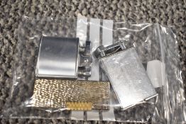 Three mid century lighters, two monogrammed; R.D.B and E.M.S including Parker Beacon,Ronson and