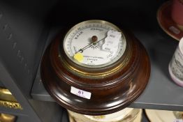 An early 20th century Negretti and Zambra,London mahogany wall mounted barometer.