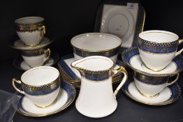 A collection of art deco Salisbury china including cups and saucers, sugar basin,jug and more having