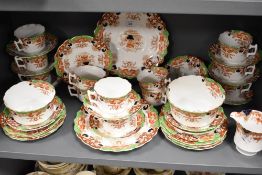 A Wellington China (J.H.C&Co Longton) teaset, transfer-printed and hand-coloured with repeating