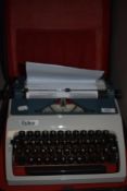 A mid century design typewriter by Erica with leather case