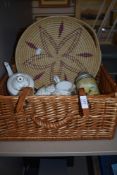 A wicker woven picnic hamper with a part tea service by Royal Standard
