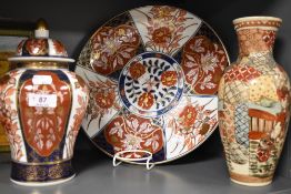 A reproduction Imari baluster form lidded urn and charger, together with an early 20th Satsuma