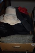 A selection of ladies fancy dress hats and mens suits