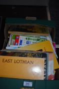 A good quantity of maps and travel brochures.