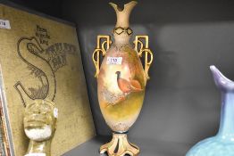 An early 20th Crown Devon vase hand decorated with pheasant scene and signed J Coleman