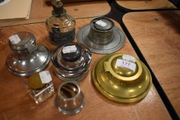 Six desk top ink wells including brass pewter and a vintage Walkdens ink bottle