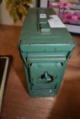 A vintage military ammunition case