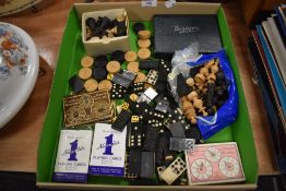 A selection of vintage board and travel games including wooden chess pieces and domino sets