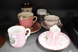 A selection of Victorian souvenir mugs and a jug of Blackpool and Bradford interest, also included