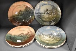 A group of eight Royal Doulton Cottage Ware or Series ware plates, muted colours, printed marks to