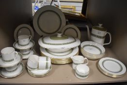 A Royal Doulton'Rondelay'part dinner service of which there are plates, coffee pot,cups and