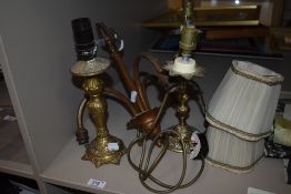 A trio of vintage table lights and a ceiling light.