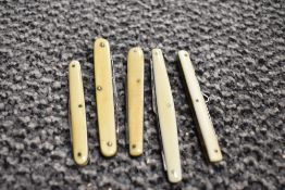 Five early 20th century boned handled pen knives.